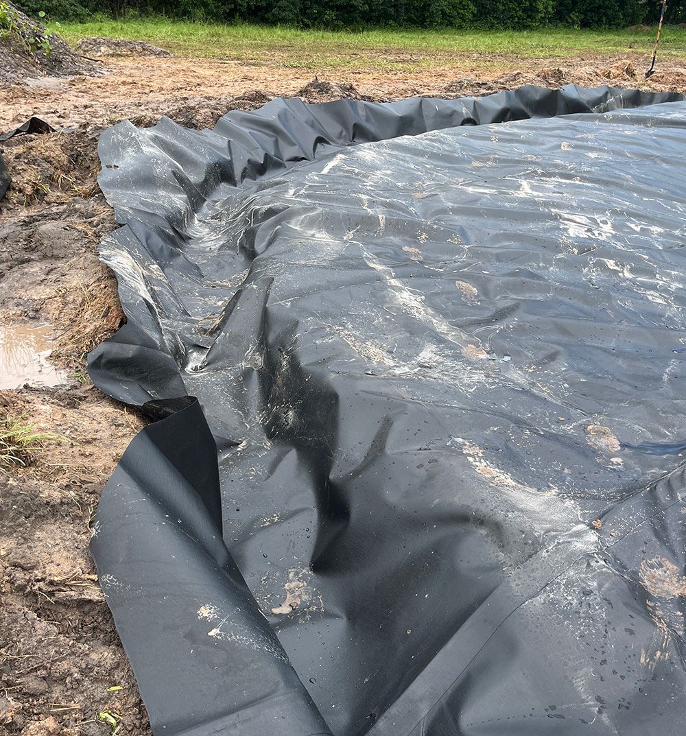 anchor trench before dirt is added over liner