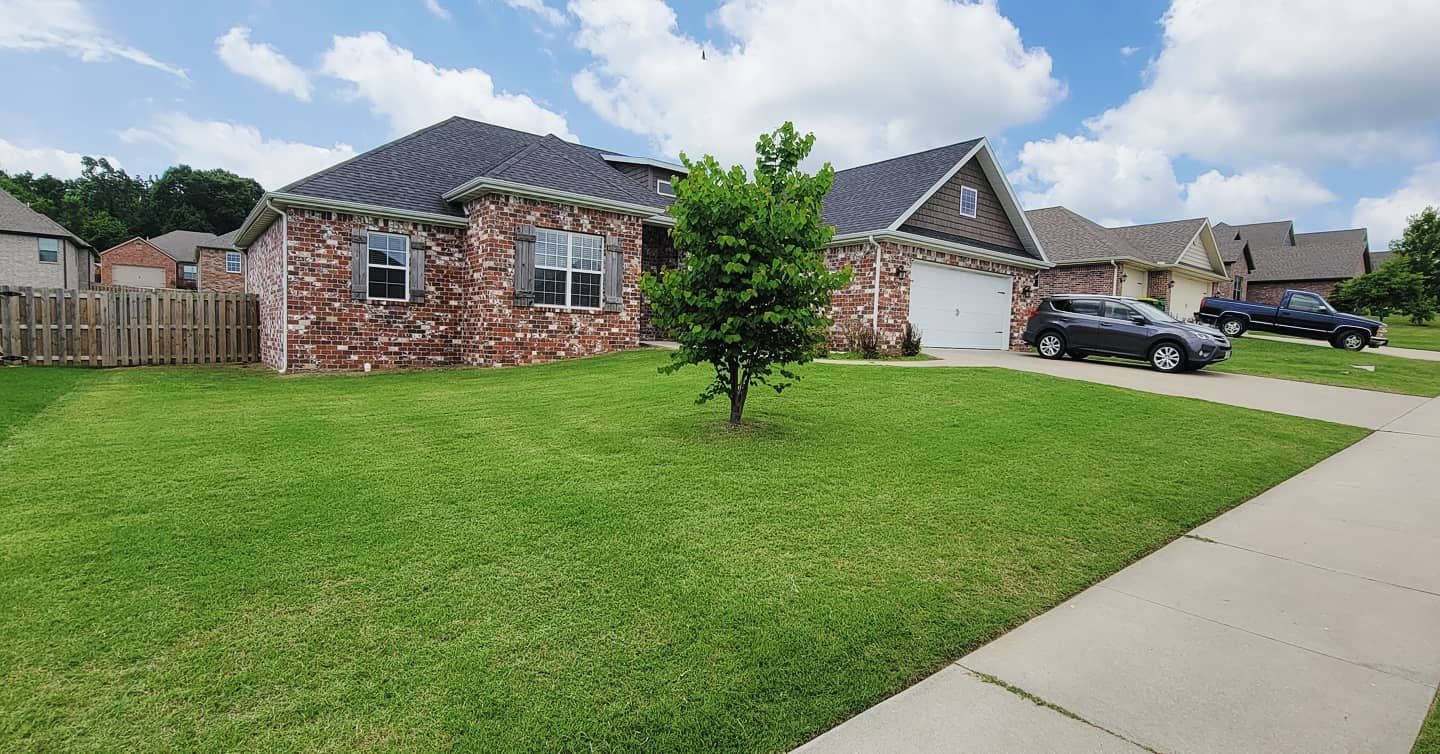 A bright green freshly mowed lawn