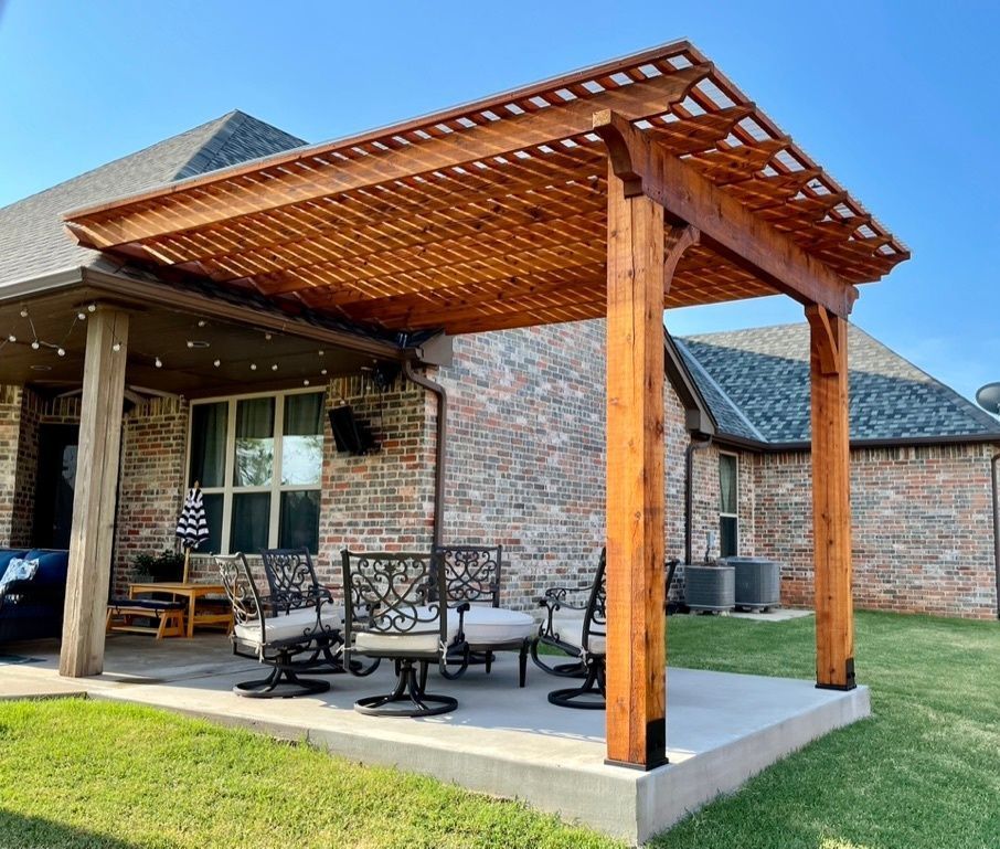 wooden gazebo over backyard patio