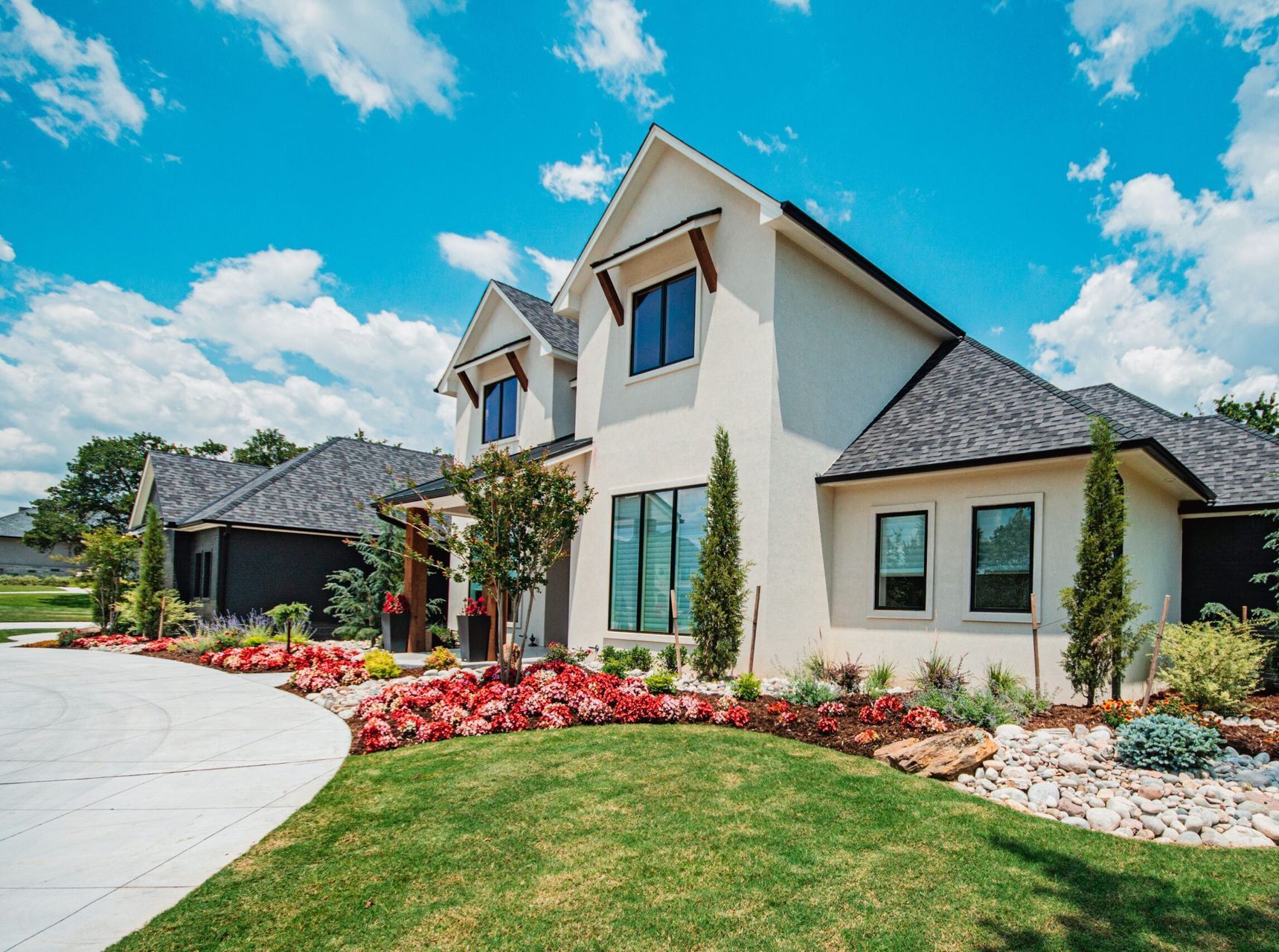 nice landscaping surrounding a home