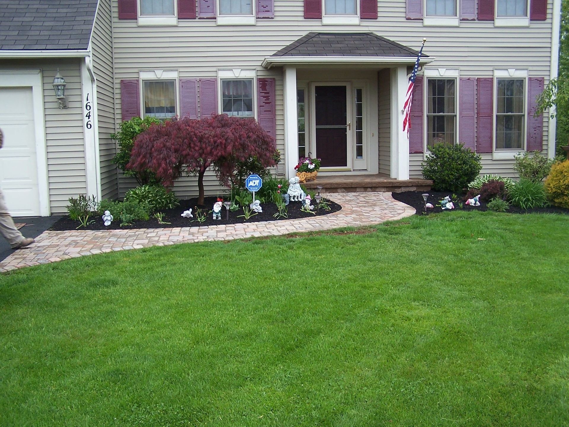 a front lawn and house