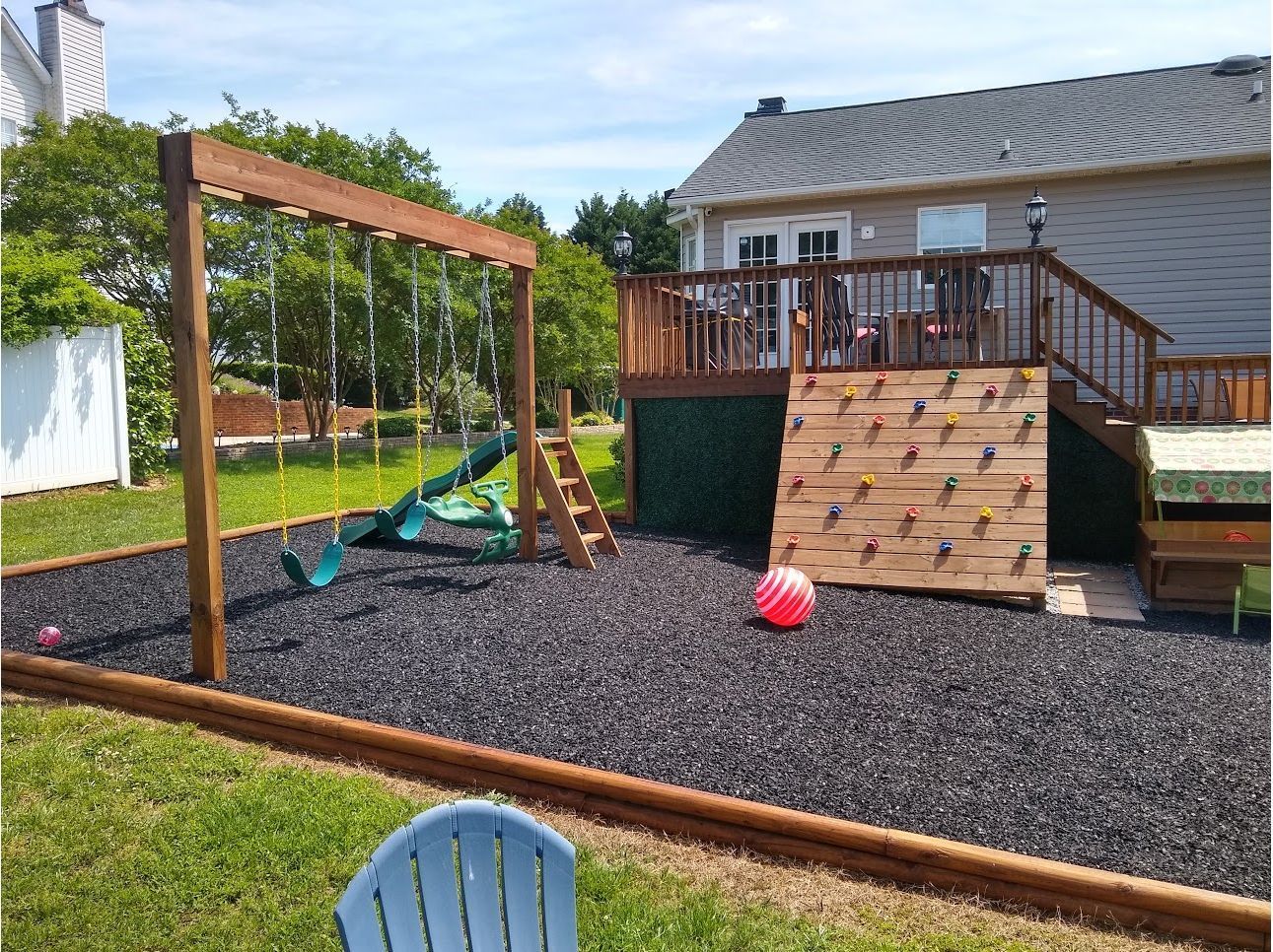 playground equipment in backyard of home