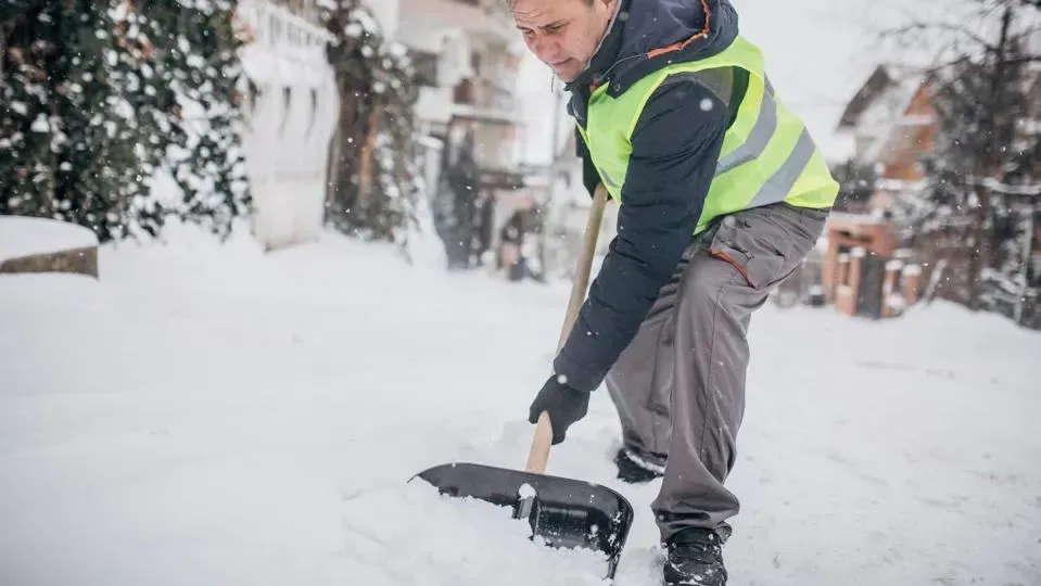 man shoveling snow