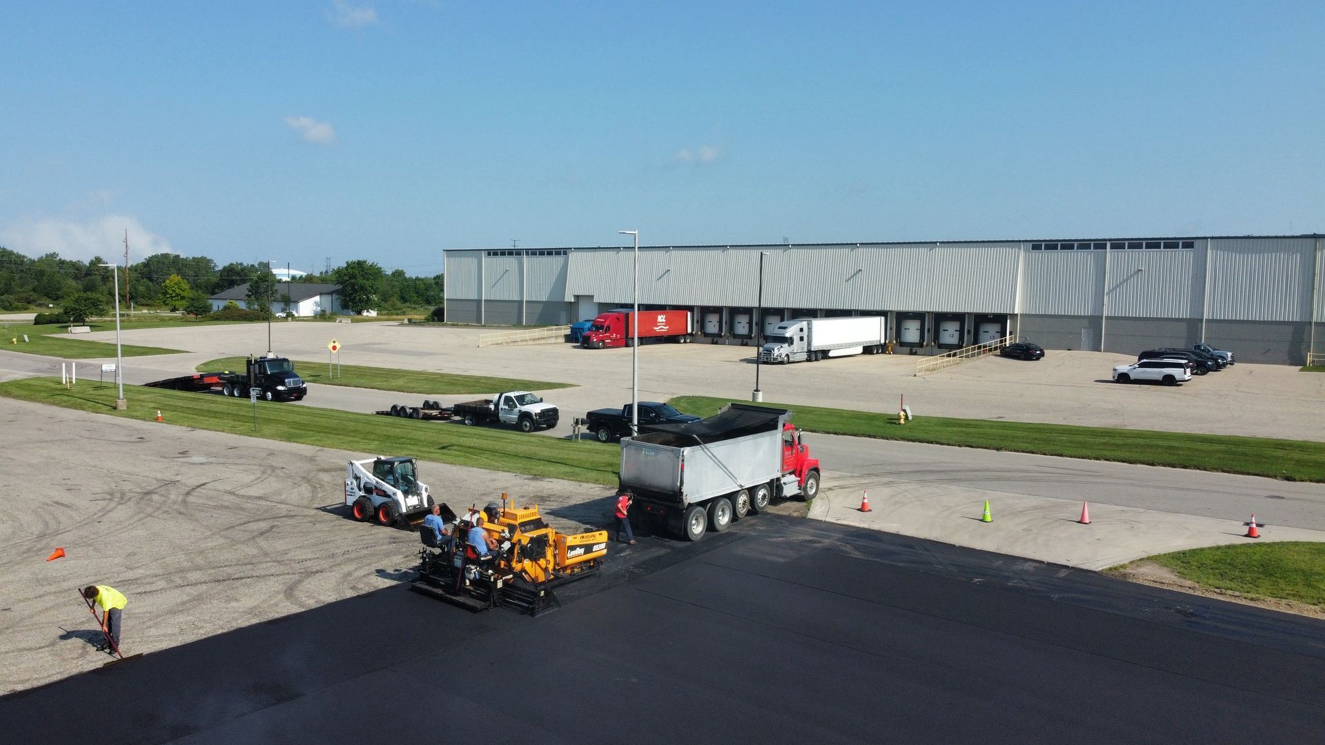 Residential Asphalt Contractor — Parking Lot in Zeeland, MI Asphalt Paving — Truck in Zeeland, MI
