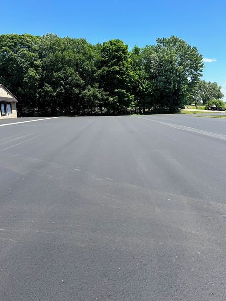 Asphalt Repair — Clean Parking Lot in Zeeland, MI Asphalt Repair — Clean Parking Lot in Zeeland, MI