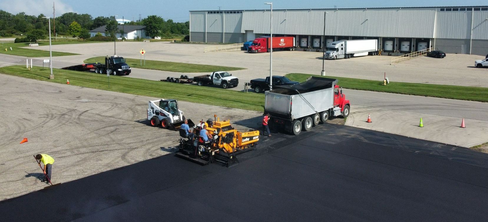 Asphalt Paving — Truck in Zeeland, MI Asphalt Paving — Truck in Zeeland, MI