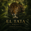 Leopard in lush greenery above El Tata Hotel Puerto Iguaz&uacute; logo