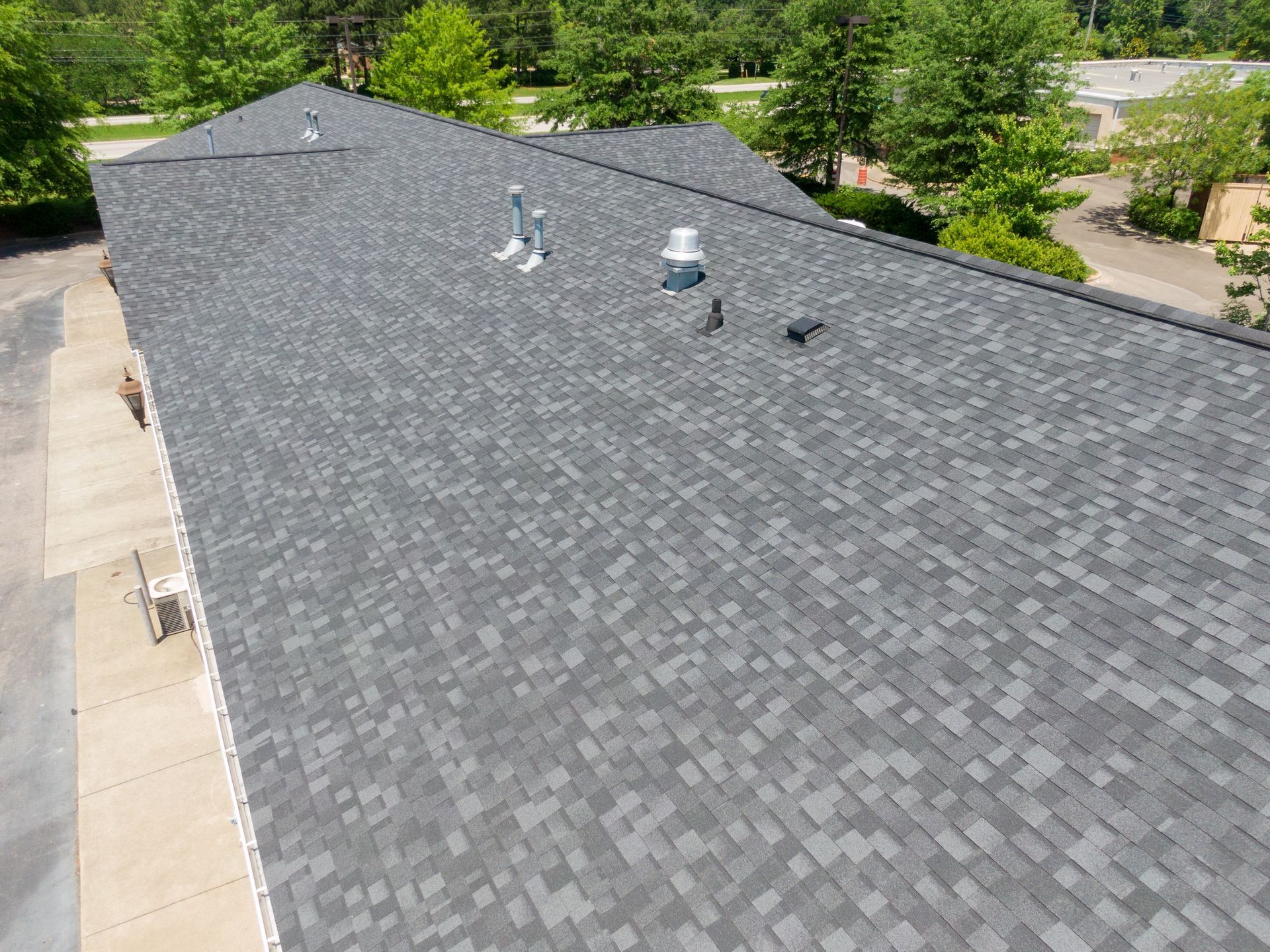 Asphalt shingle commercial roof installation in the Midwest