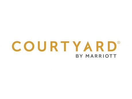 Courtyard by Marriott logo in gold and gray on a white background