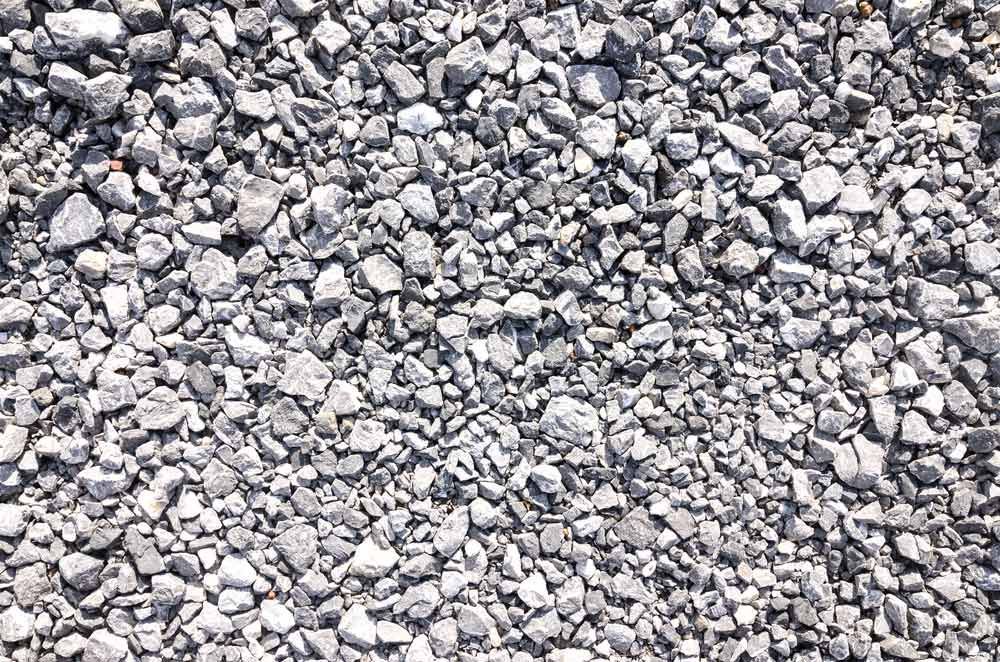 A Pile of Gravel is Sitting on the Ground — Dampier Street Landscape Supplies in Taminda, NSW