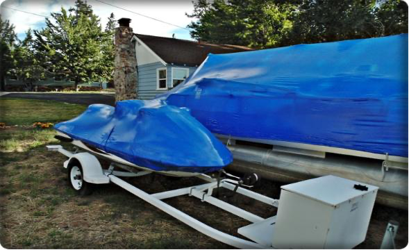 Jet Ski and boat on trailer