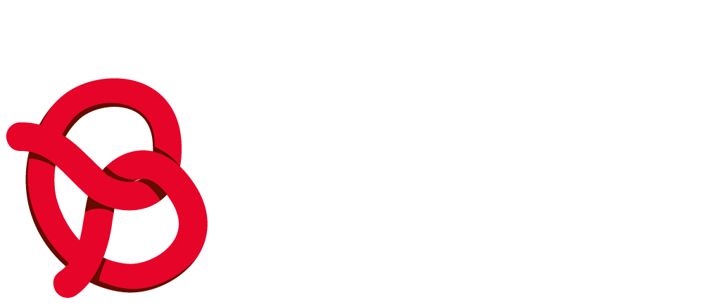 Un bretzel rouge avec un nœud au milieu sur fond blanc.