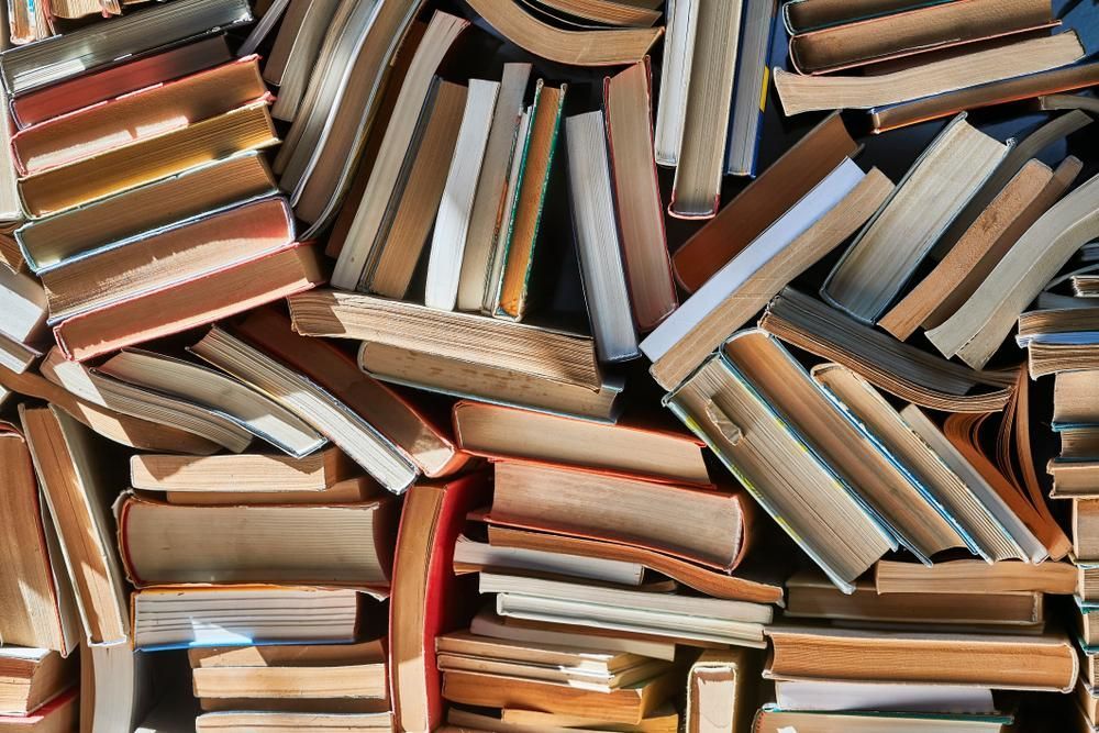 A Pile of Books Stacked on Top of Each Other — Demco in Currumbin Waters, QLD