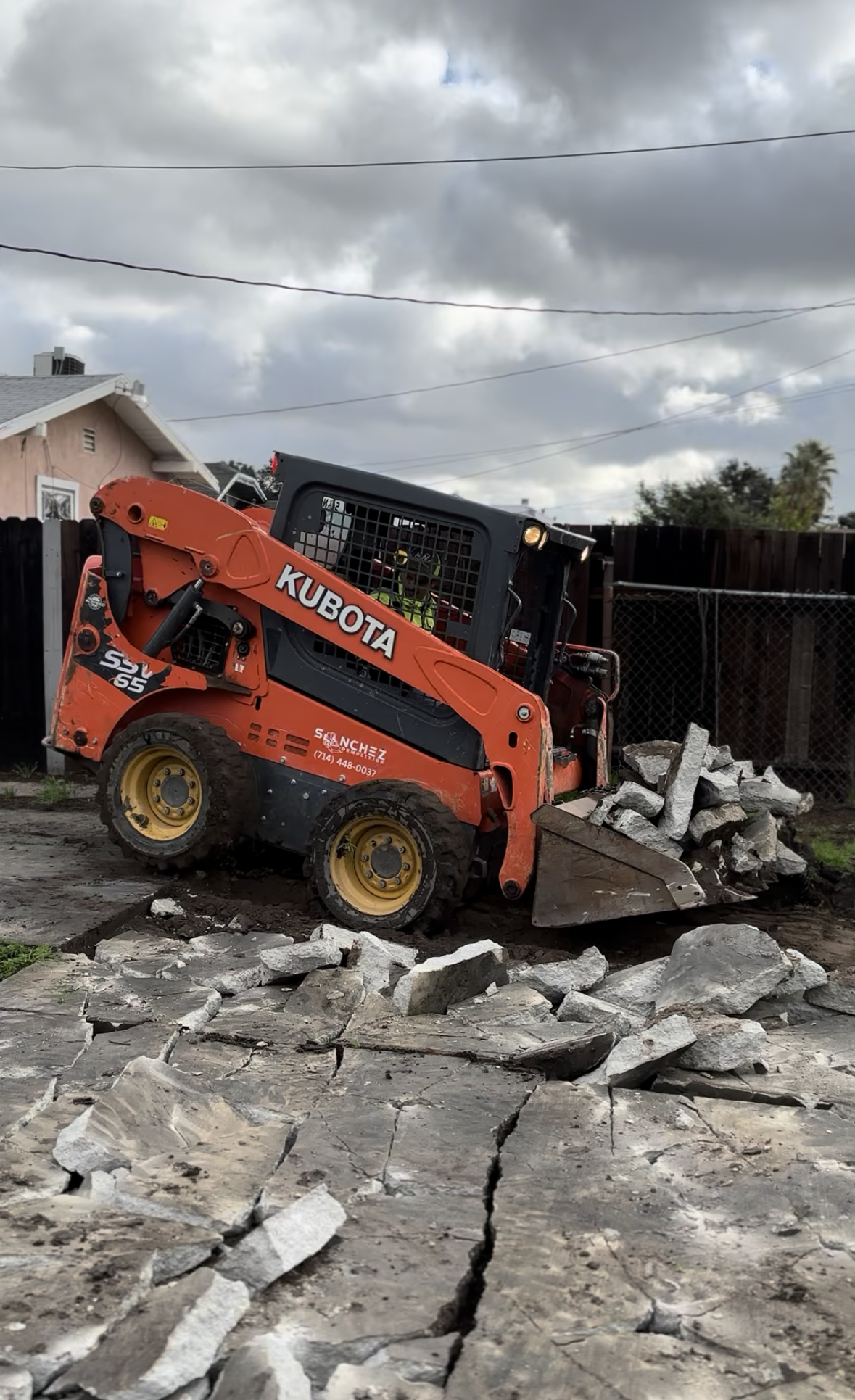 Demolition, removal, haul off, disposal, grading, forming, compacting and pouring for new concrete driveway in San Bernardino
