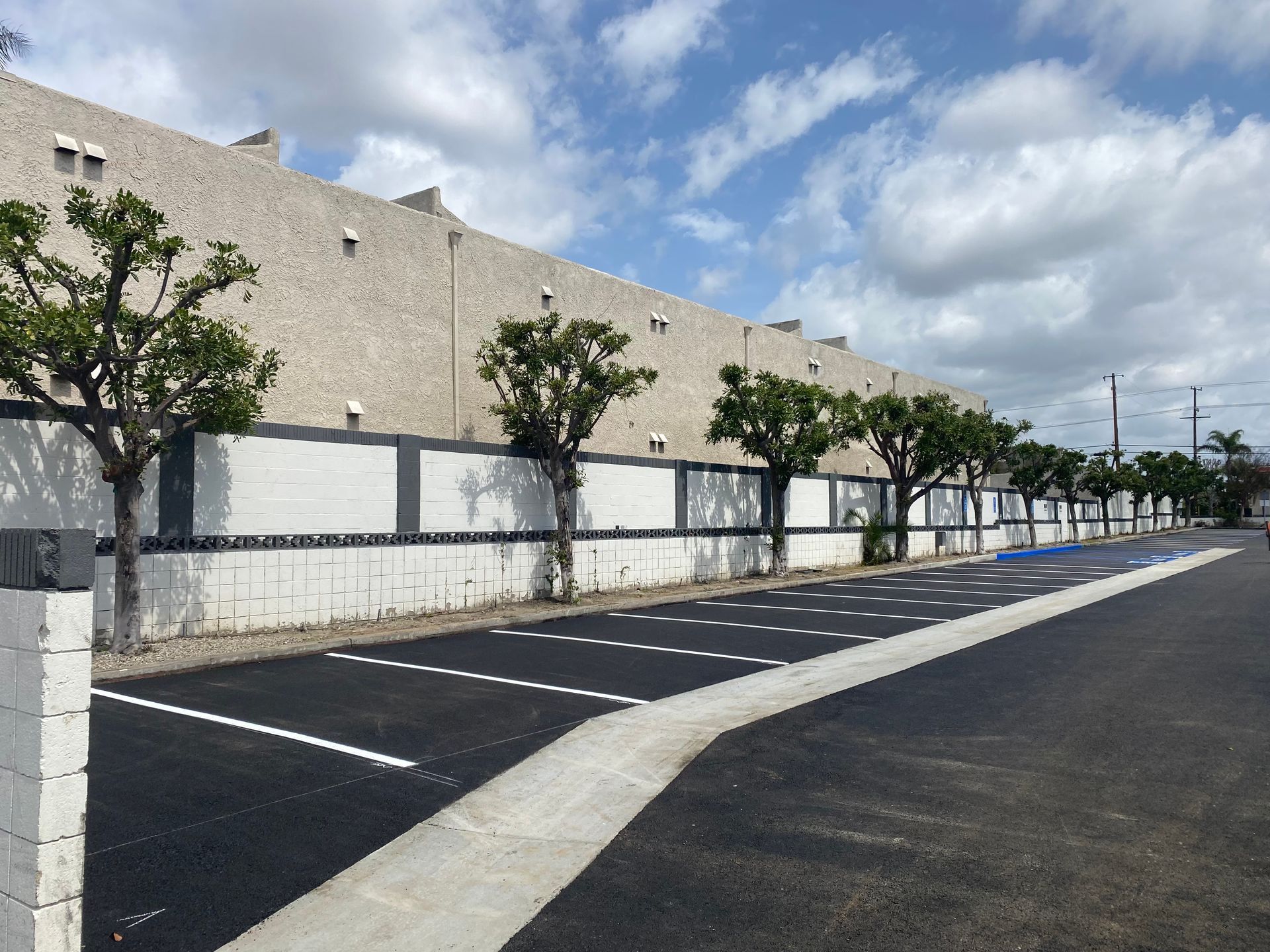 Concrete v-ditch and asphalt parking lot replacement project