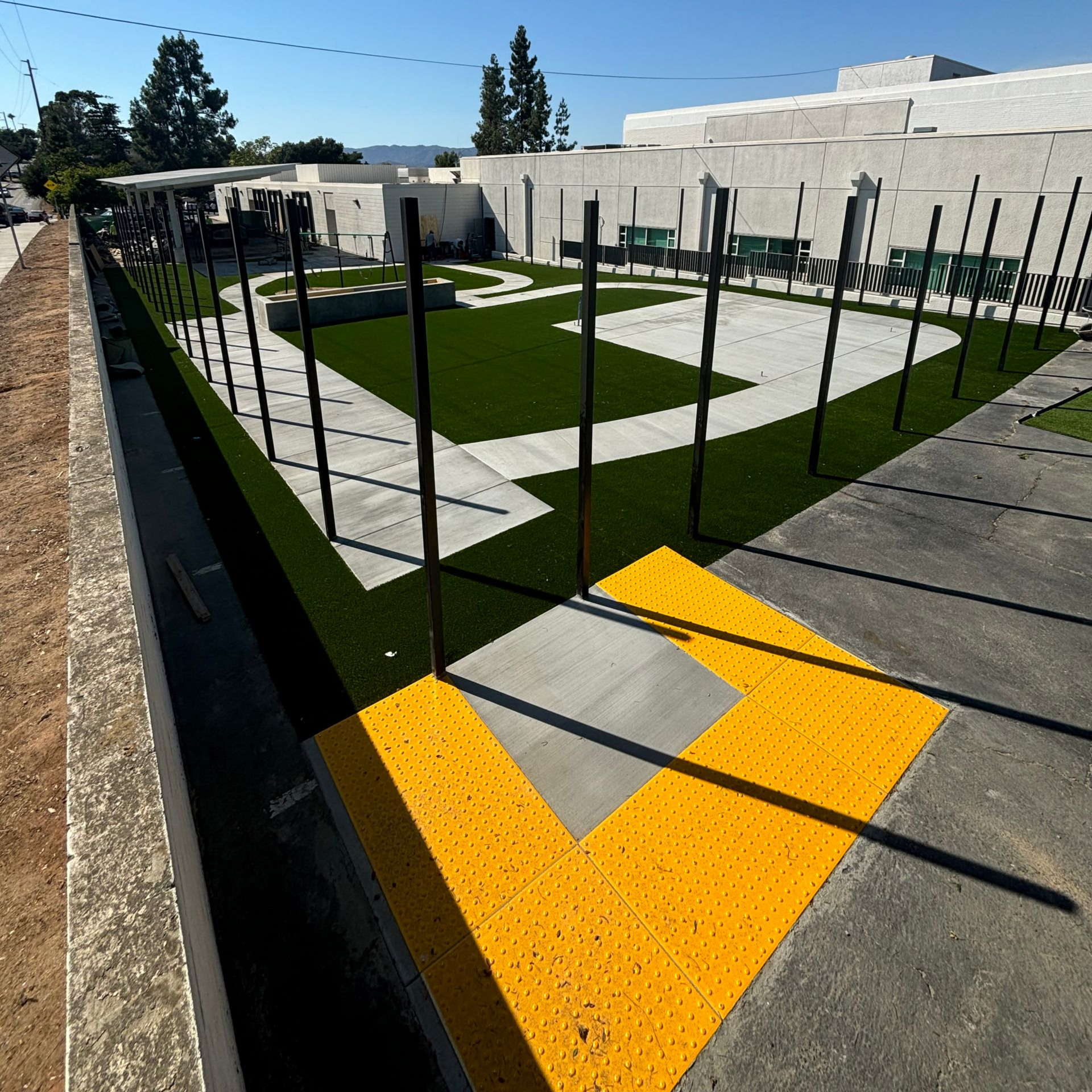 Asphalt parking lot demolition, removal, concrete replacement, and turf installation in the Inland Empire