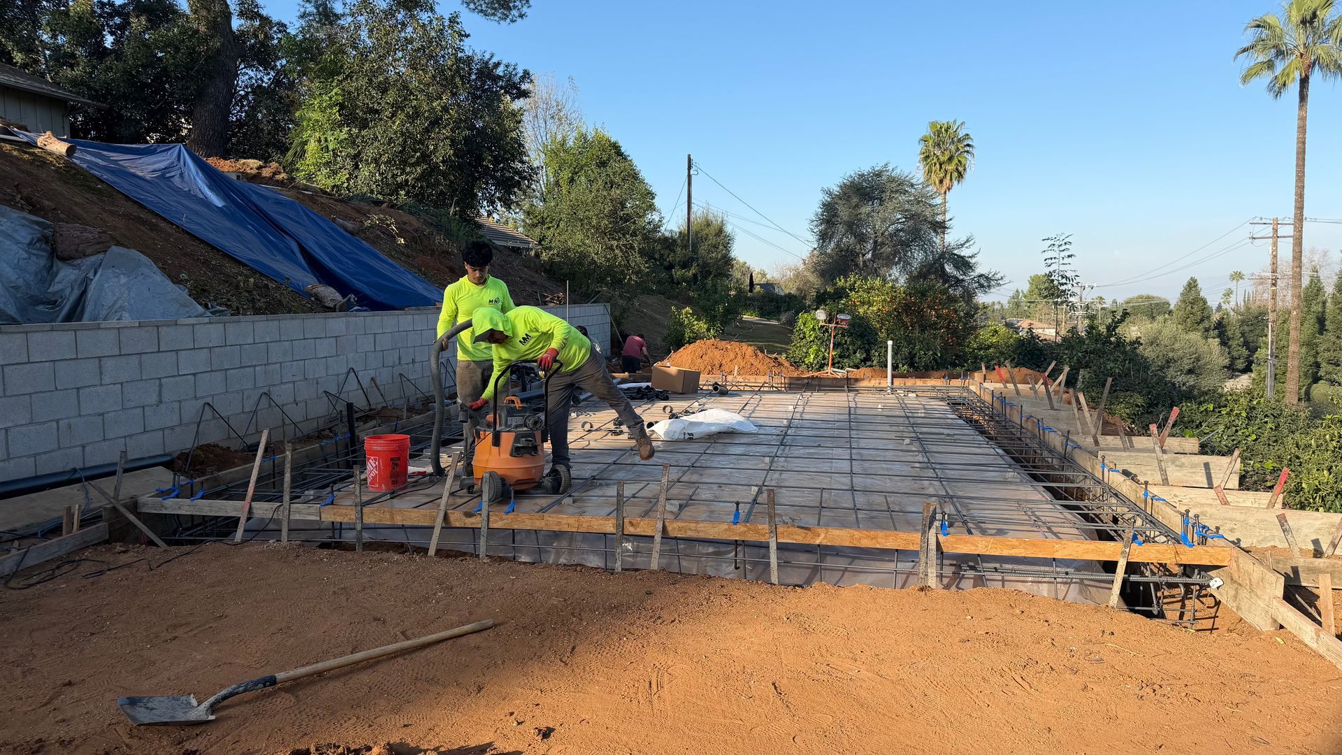 ADU concrete slab preparation with grading, forms, and reinforcement in Inland Empire