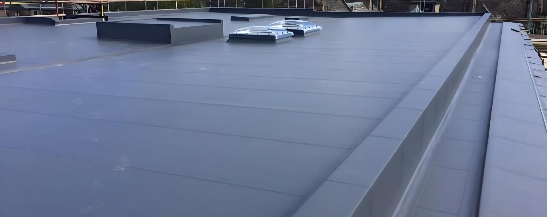A close up of a roof with a rubber roof.