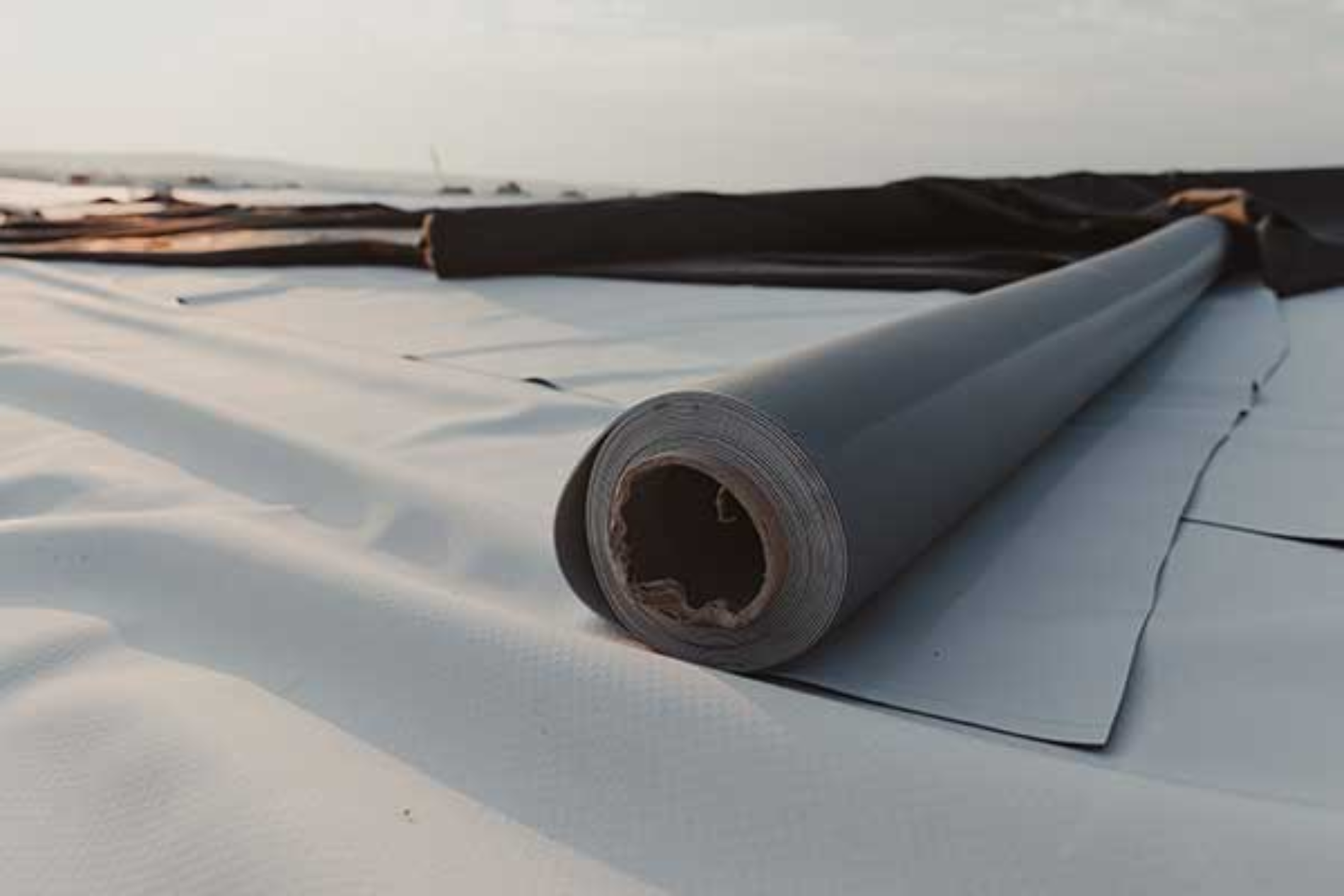Single-ply membrane roll for a commercial roof restoration in Hudson, WI