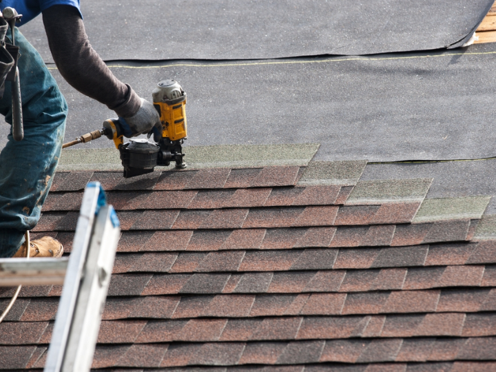 Lexington, KY, Ark roofer fixing hole saw tooth for roof replacement