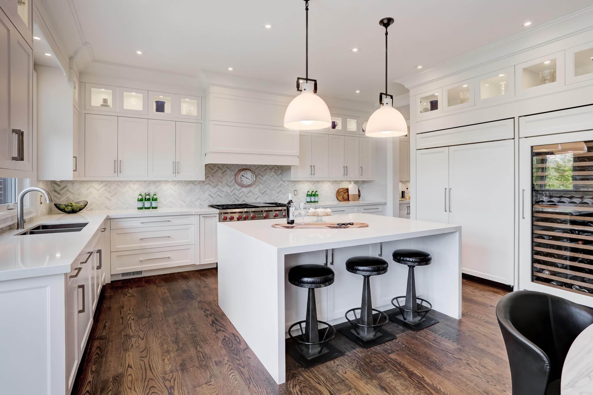 There is a large island in the middle of the kitchen.
