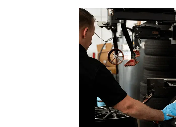 Our Mechanic Working on Tire in Richmond, VA - The Euro Shop