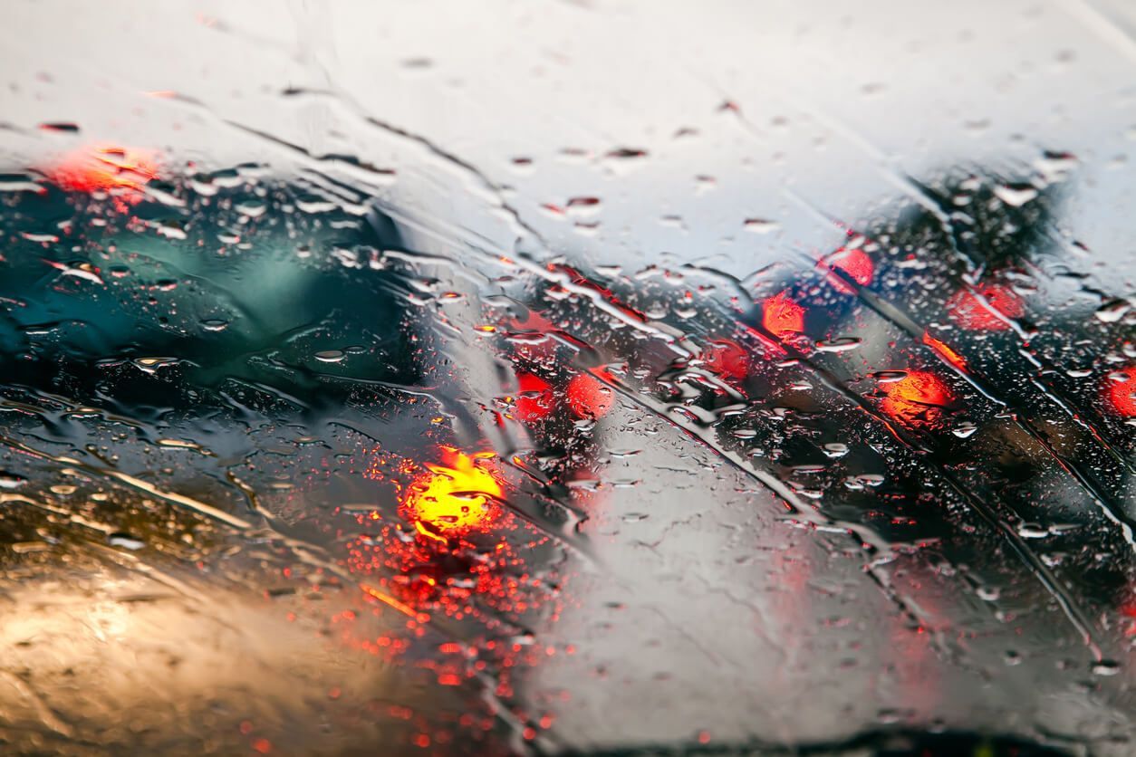 A close up of a car windshield with rain drops on it. | The Euro Shop