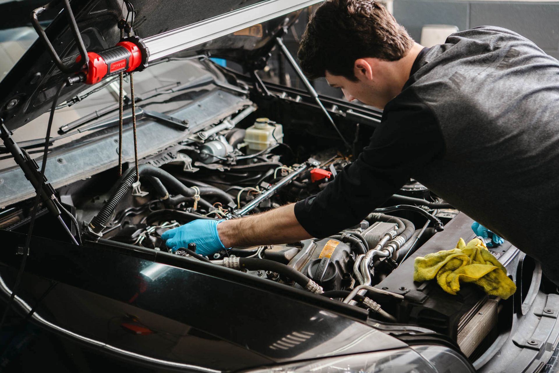 The Technician Working on Vehicle Engine in Richmond, VA - The Euro Shop