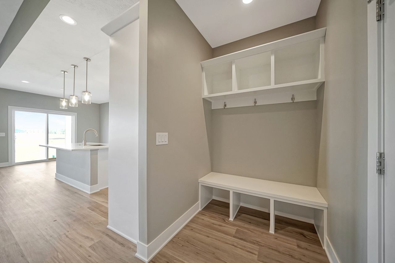 There is a bench in the middle of the room.