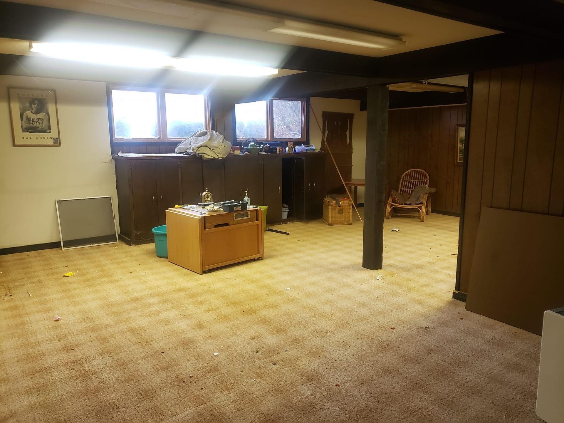 An empty room with a table and chairs in it