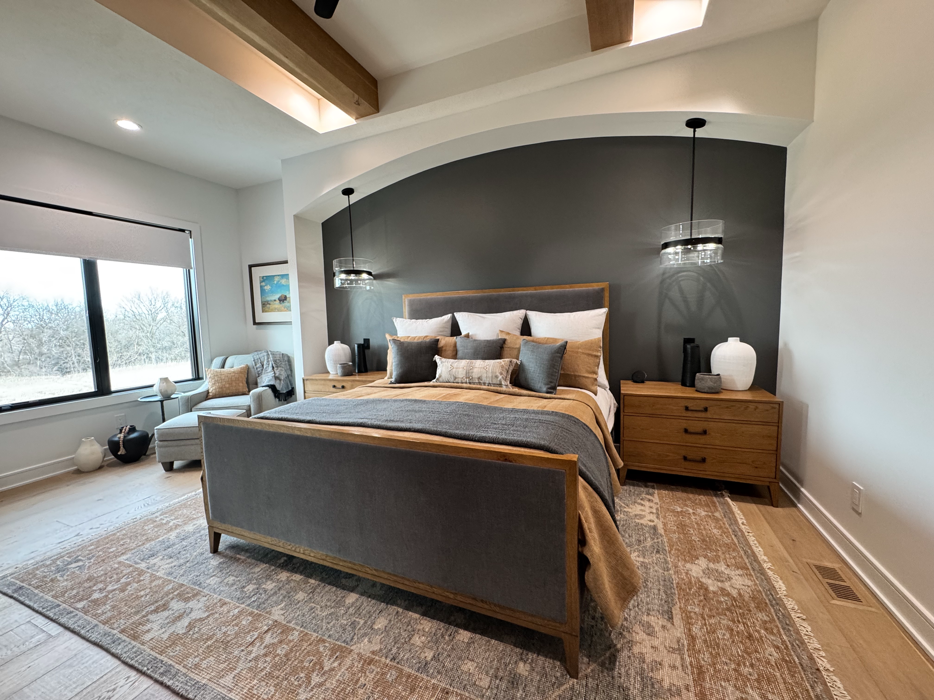 There is a large bed in the middle of the room.