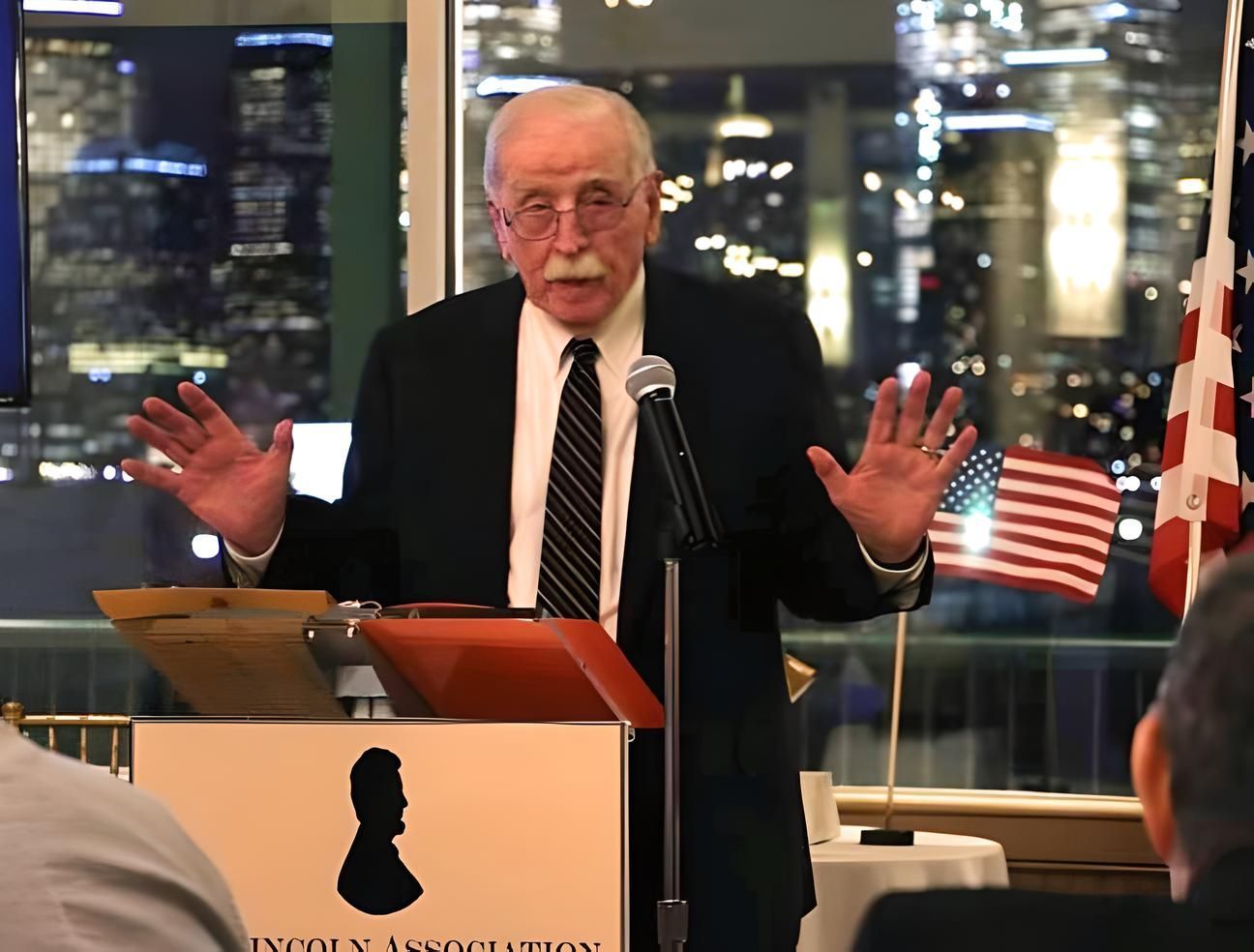 member of the lincoln association of jersy city giving a speech during the annual dinner event