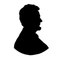 Black silhouette of abraham lincoln in side profile on a white background