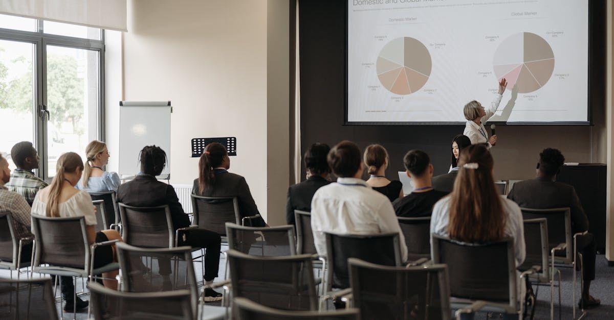 group of businesspeople taking a seminar
