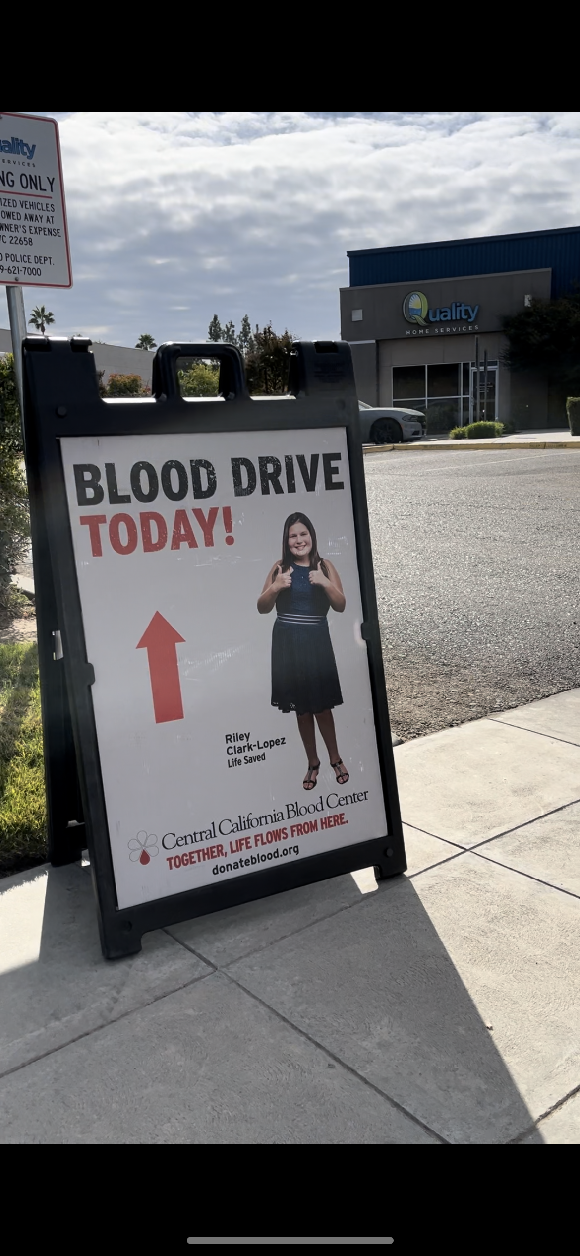 Sign for a blood drive today, with an upward pointing arrow.
