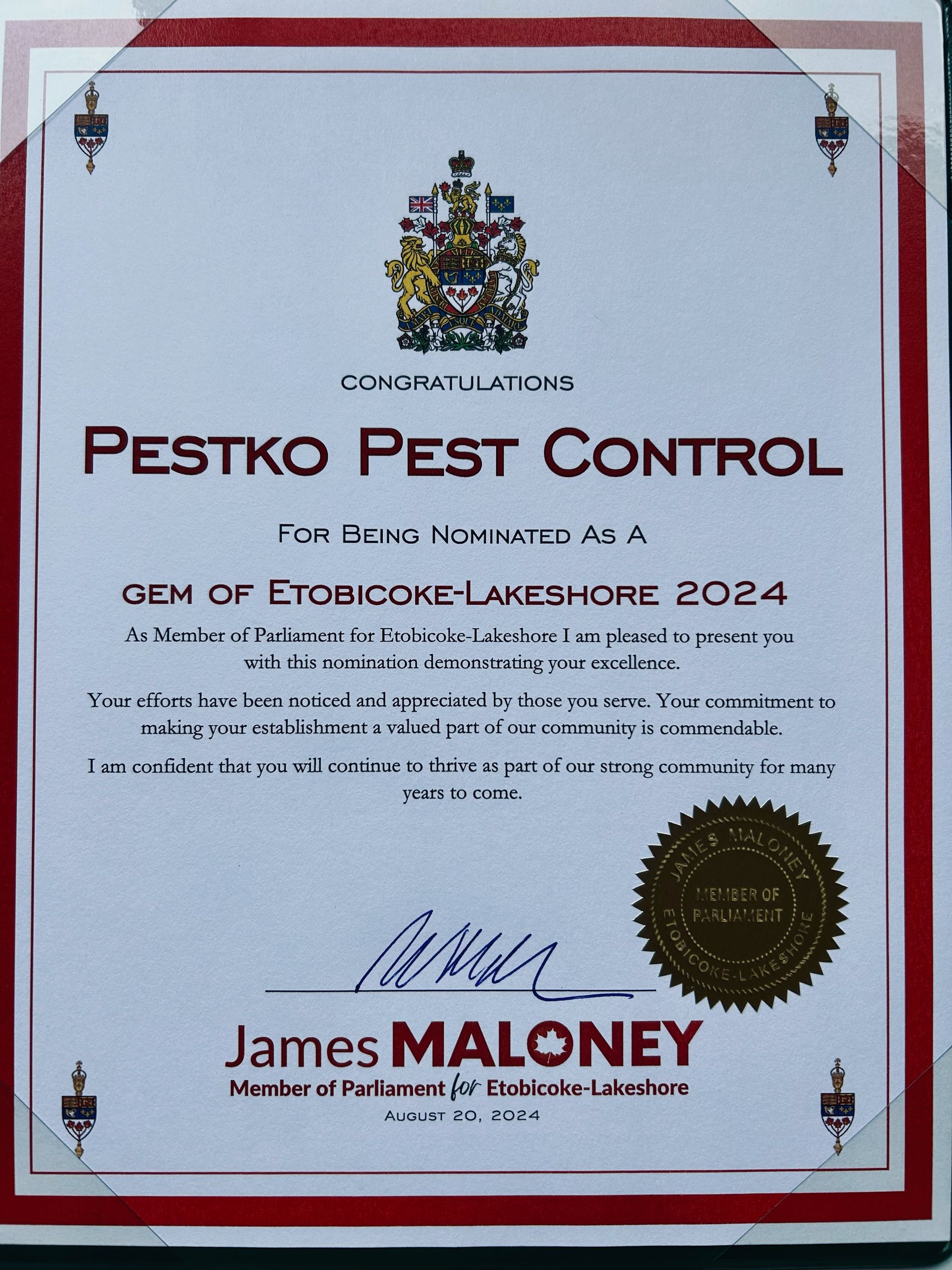 A certificate that says pestko pest control is signed by james maloney