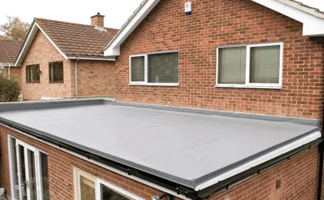 An image showcasing the installation process of a gutter guard system.