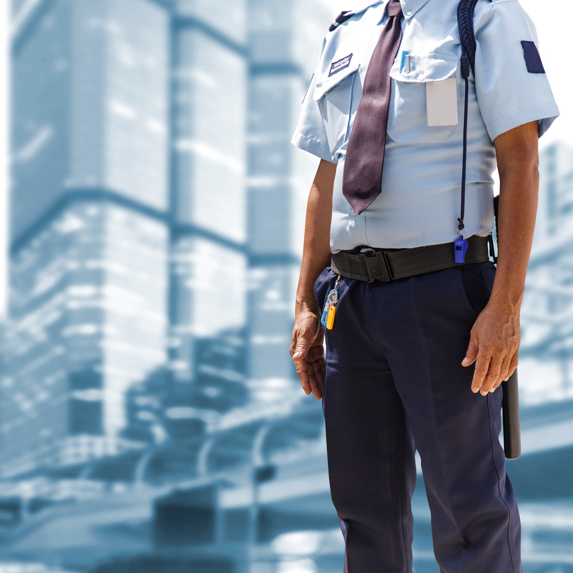 Professional guard on duty providing dedicated on-site security for a corporate building. Professional guard on duty providing dedicated on-site security for a corporate building.