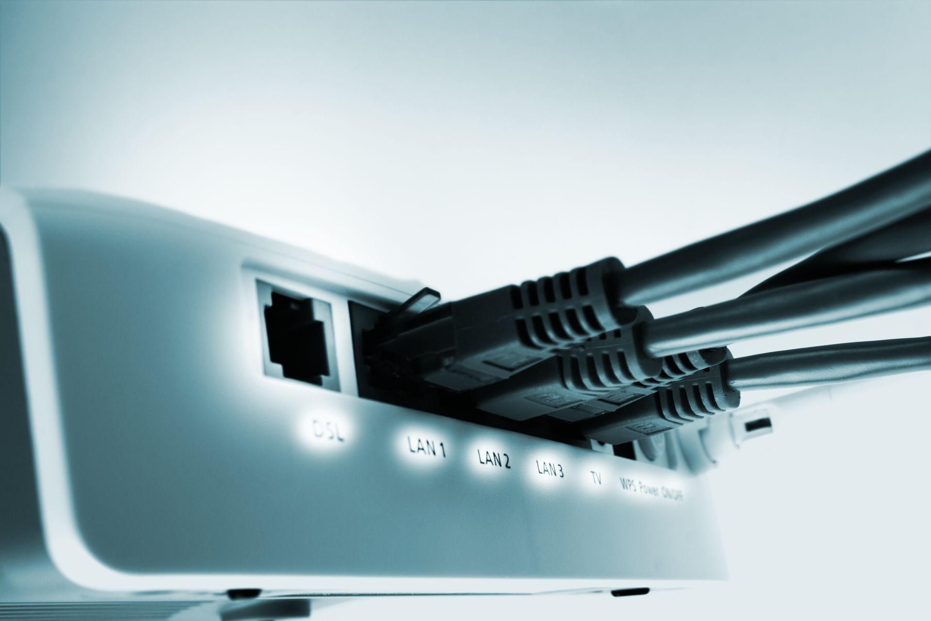 A bunch of wires are plugged into a computer