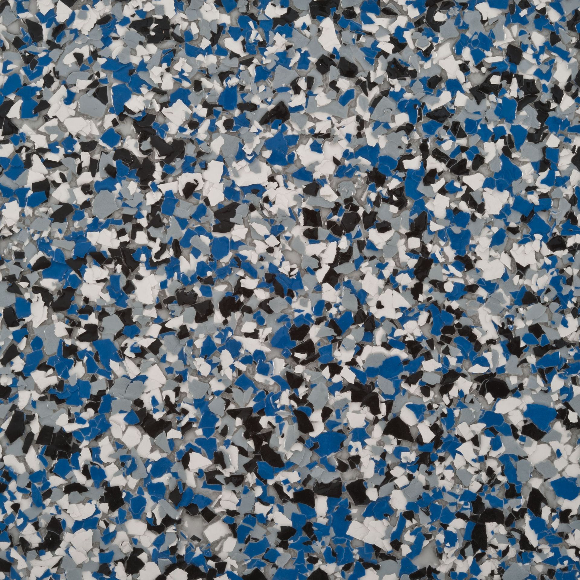 Un gros plan d'un sol en marbre bleu, gris et blanc.