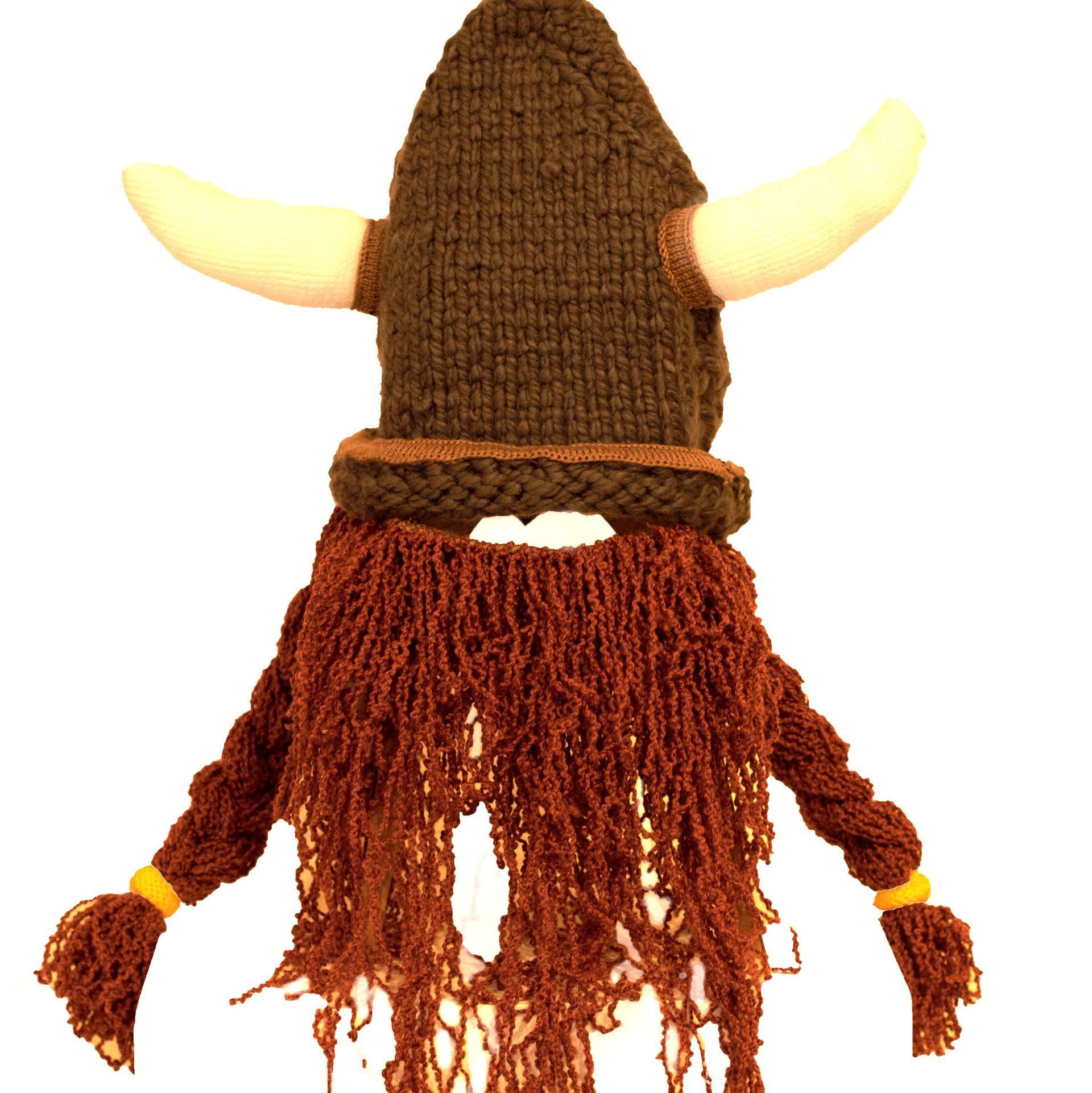 A knitted viking hat with horns and a beard