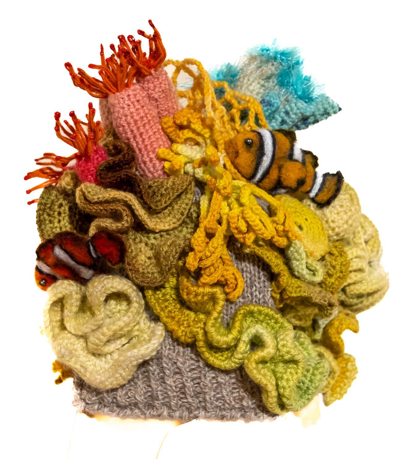 A crocheted coral reef with a clown fish in the middle