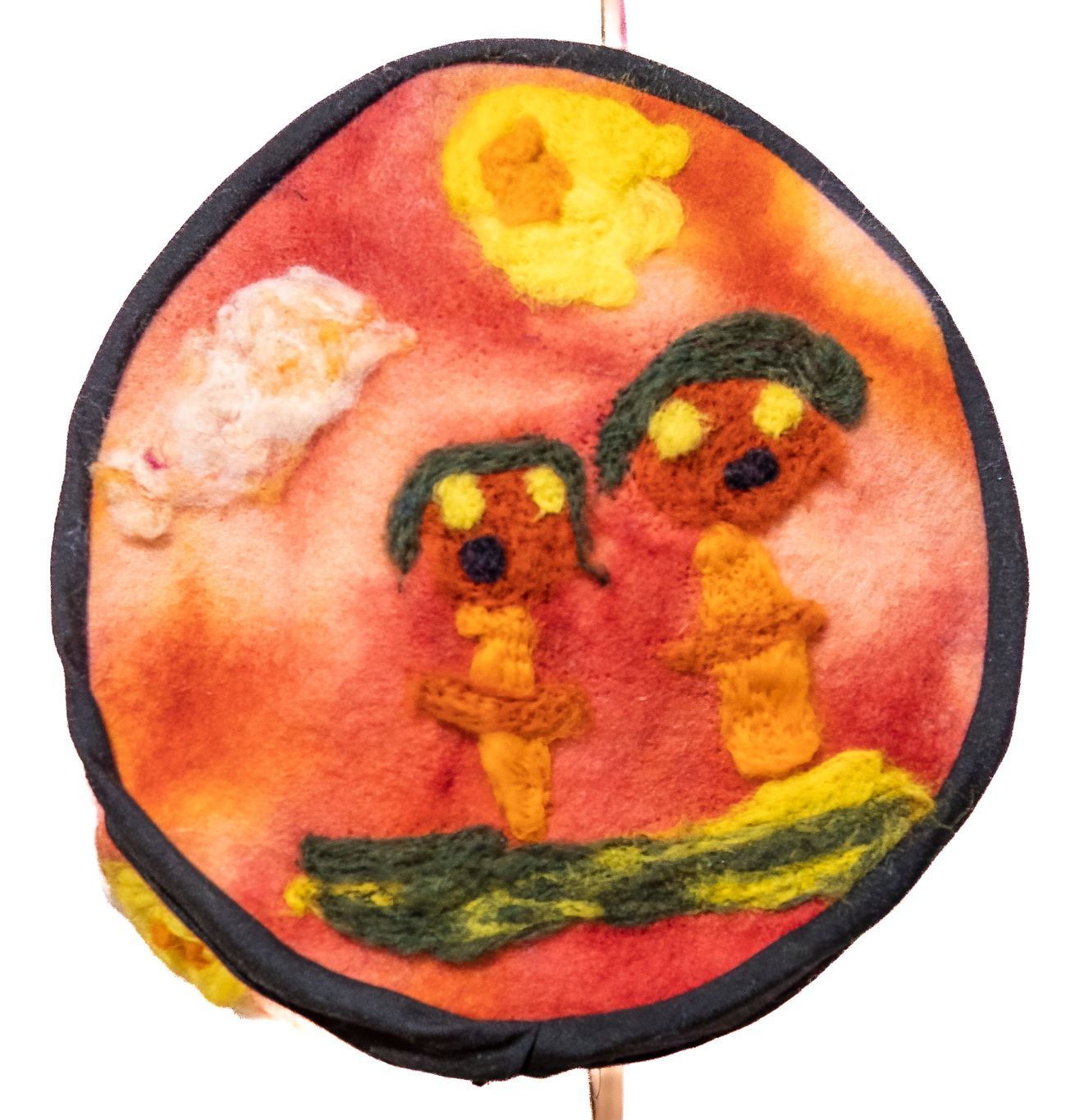 A circle with a picture of two people on it