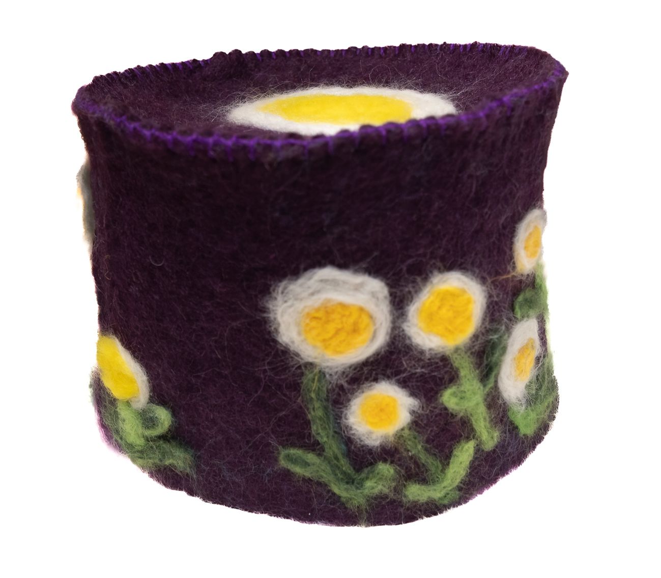 A purple cylinder with yellow and white flowers on it