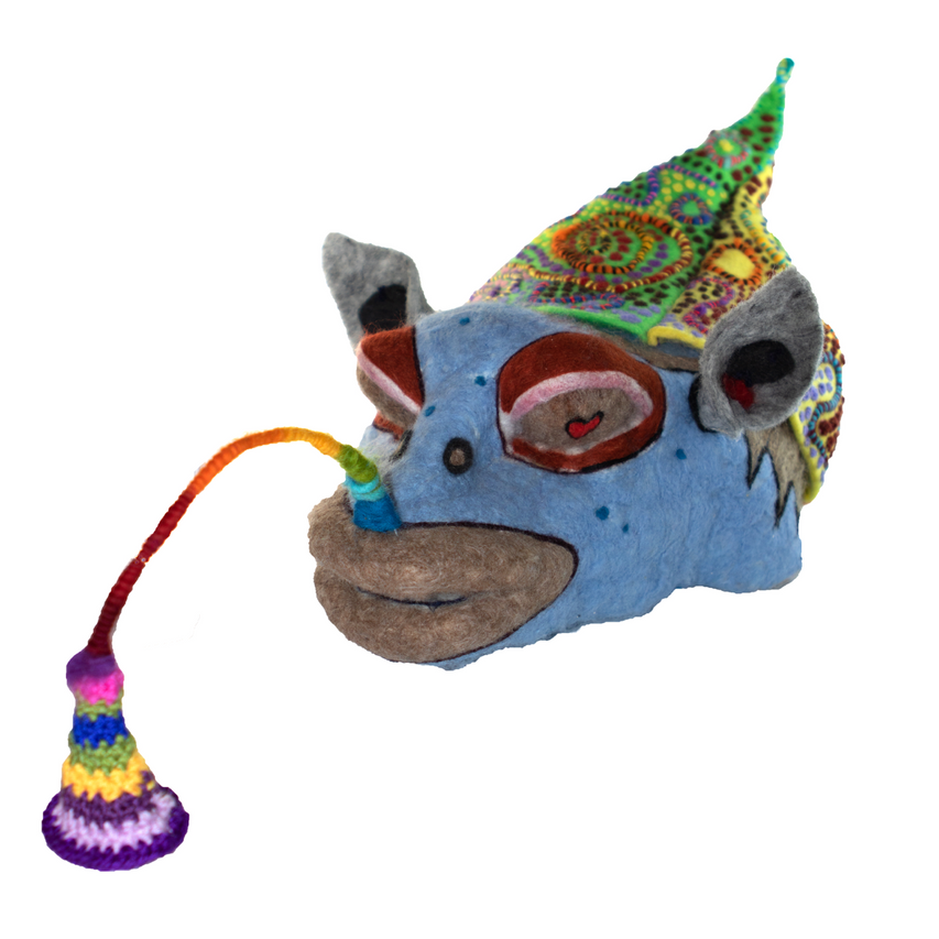 A stuffed animal with a rainbow on its nose