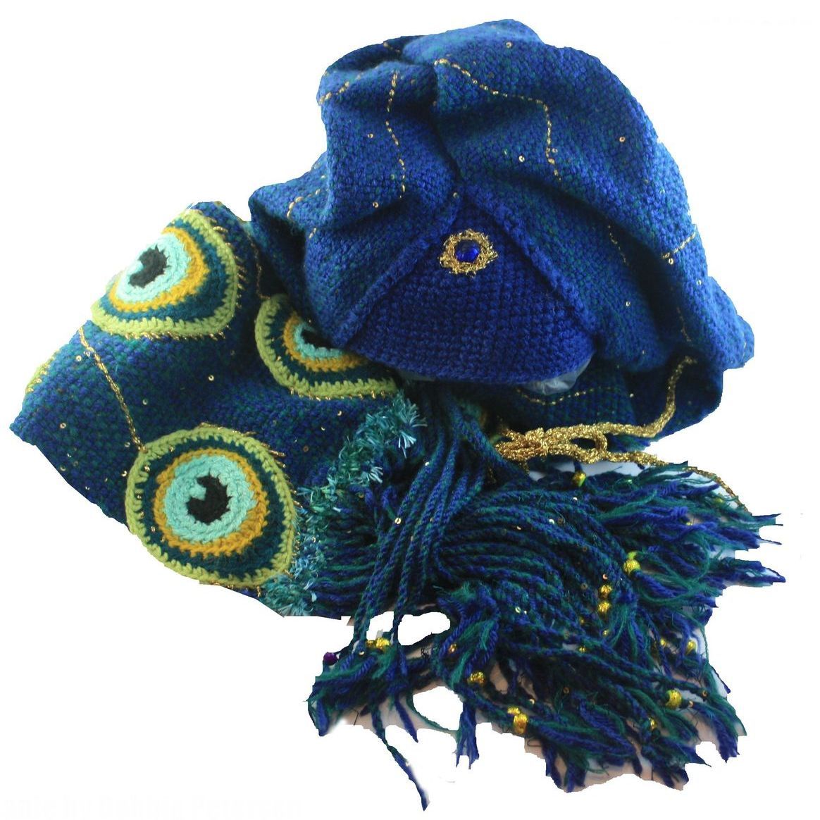 A blue scarf with peacock feathers on it