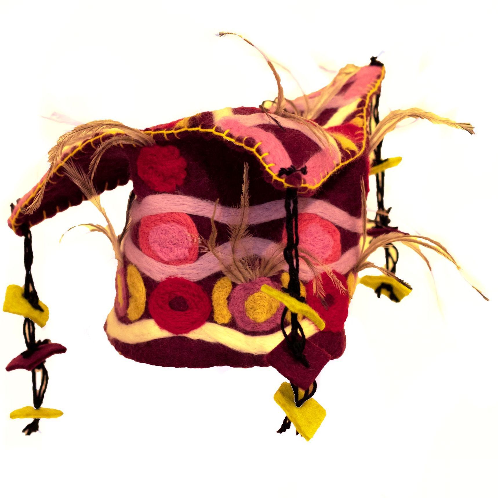 A purple and yellow hat with flowers on it