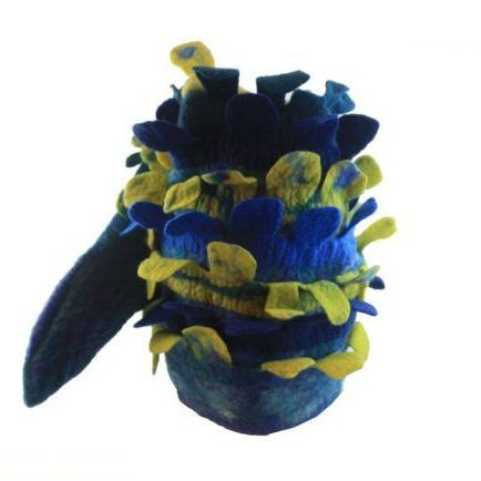 A blue and yellow hat with flowers on it