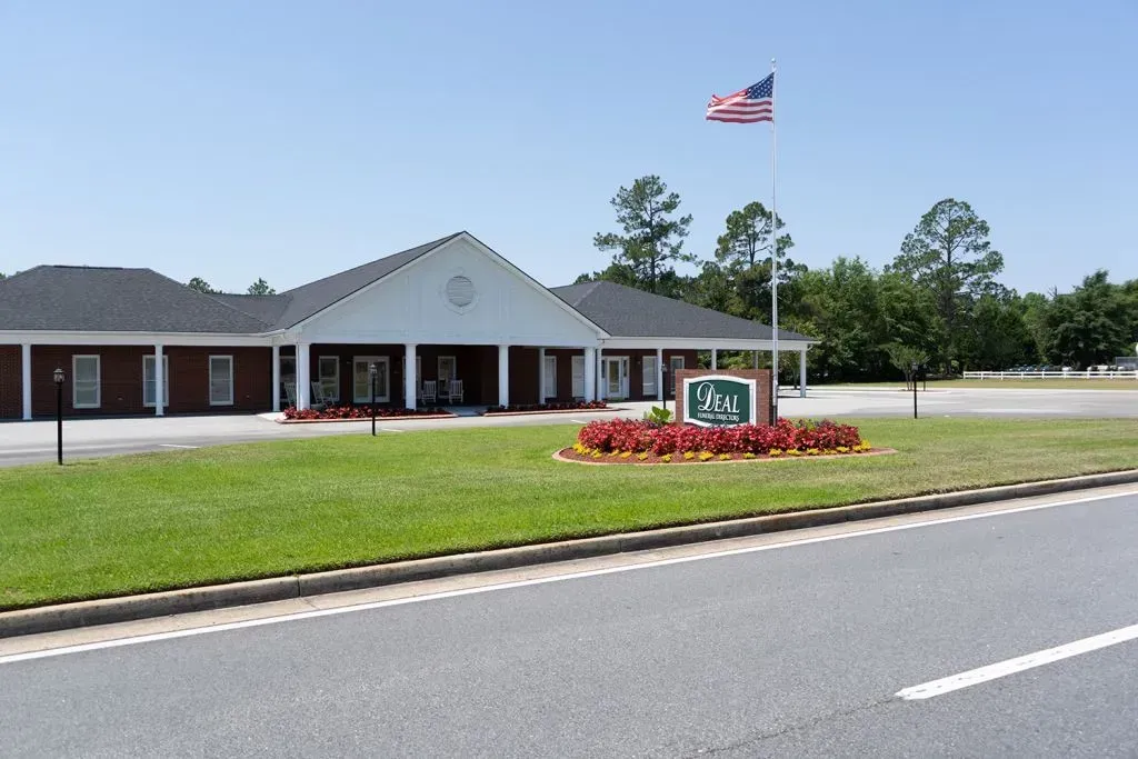 Building with American flag and sign that reads
