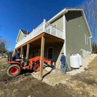 Workers Pouring Gravel